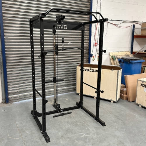 ADVG A1 Power Rack Cage with Lat and Row Pulley, front three-quarter view in the warehouse