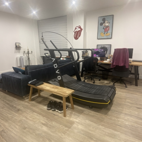 ADVG Commercial Curved Treadmill CurveMax 1.0 in a home living room
