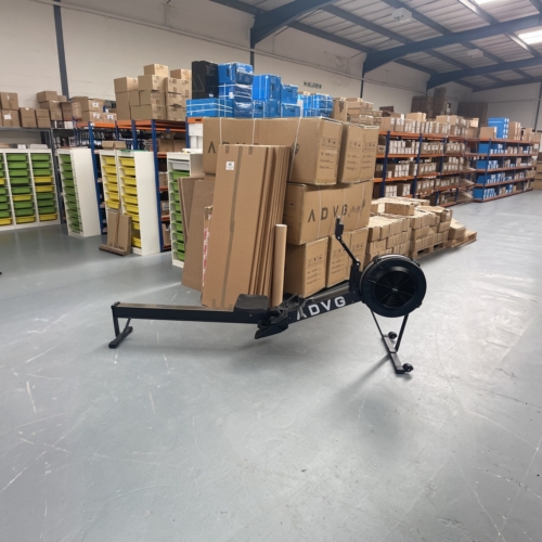 ADVG RowErg PowerMax 1.0 rowing machine, side view in the warehouse