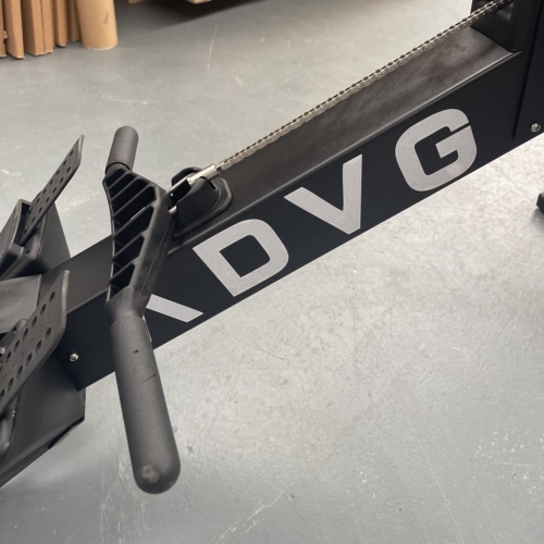 ADVG RowErg rowing machine in the ADVG warehouse – handle and rail with the ADVG logo